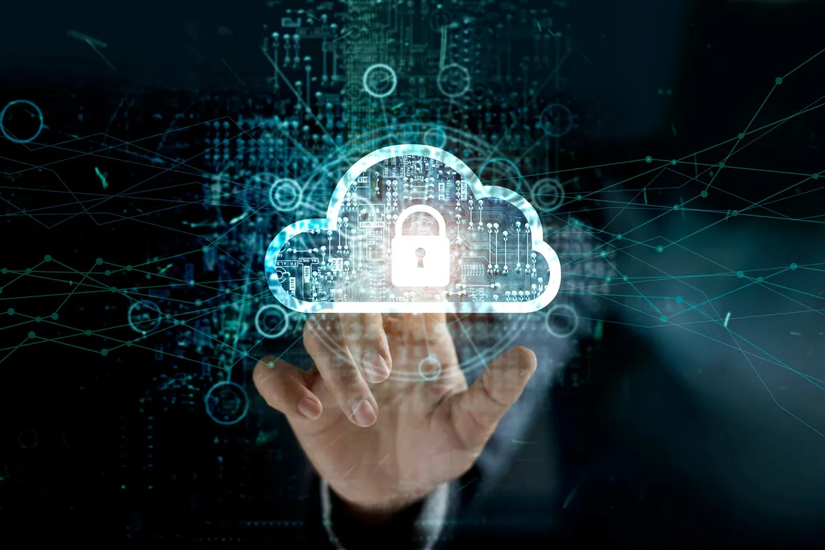 hand-pointing-at-cloud-with-security-icon-on-it cloud_security
